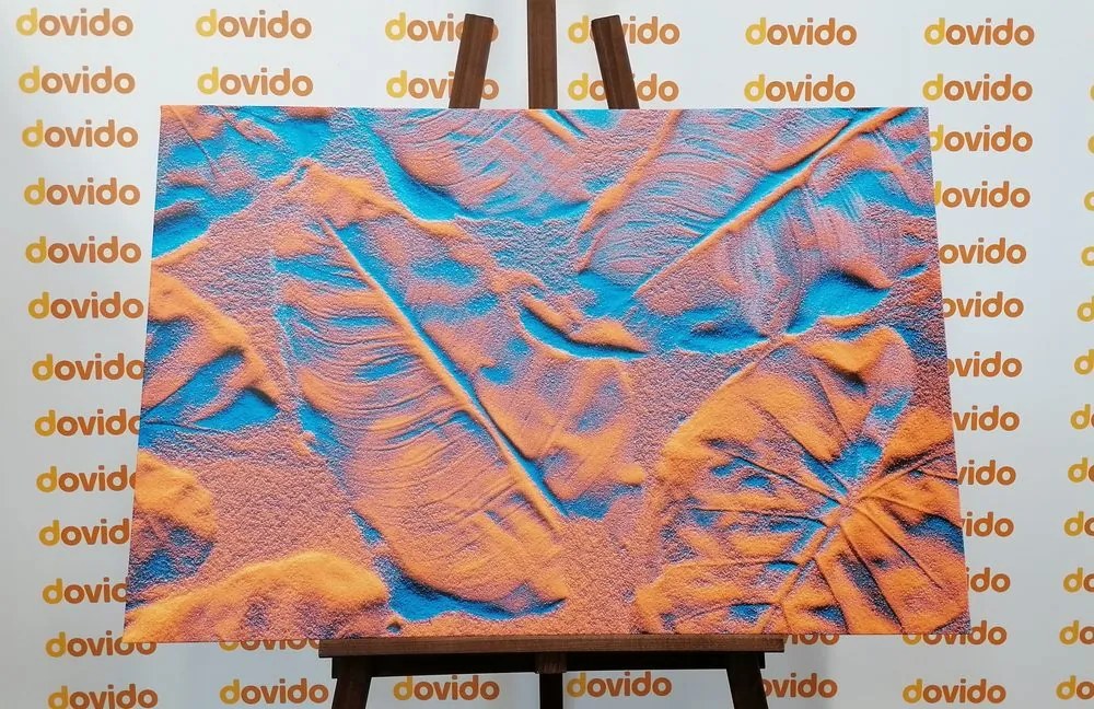Quadro su tela – Texture di foglie sulla spiaggia di sabbia