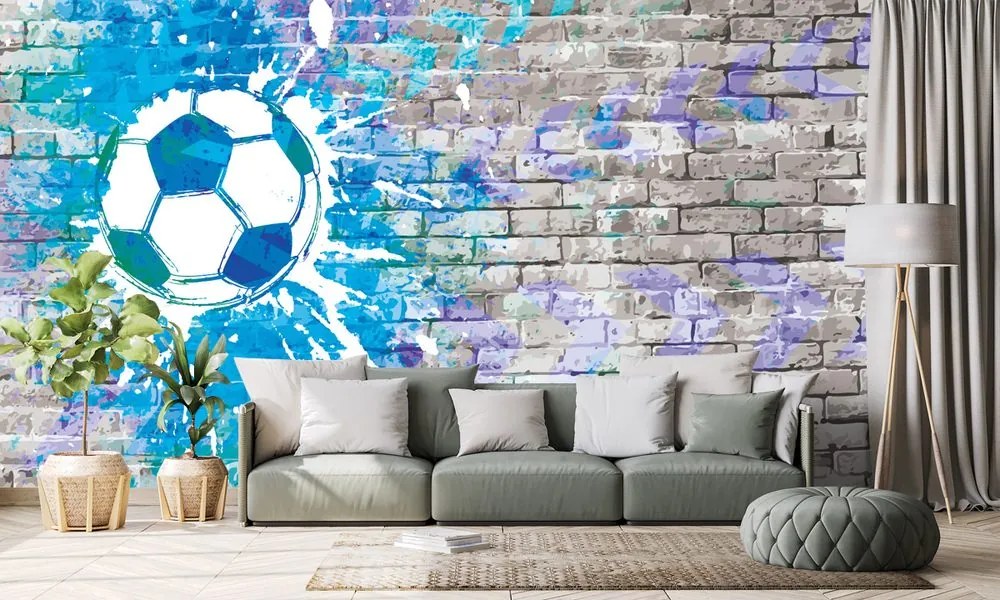 Carta da parati – Palla da Calcio Blu su Muro di Mattoni