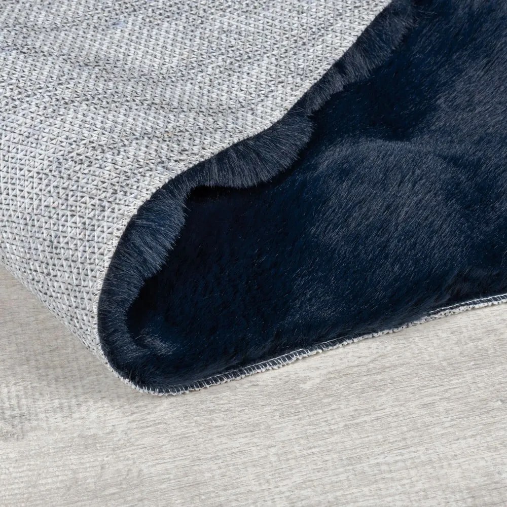 Tappeto in pelliccia sintetica blu scuro 180x290 cm Waffle Faux Fur - Flair Rugs
