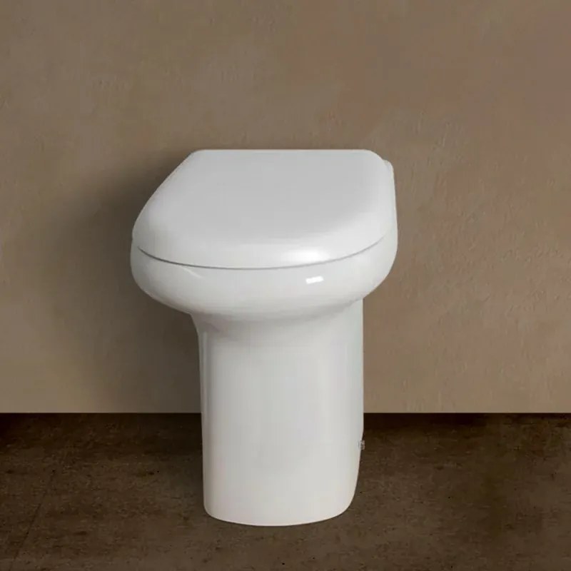 Wc tradizionale con brida serie Orient in ceramica con scarico a pavimento