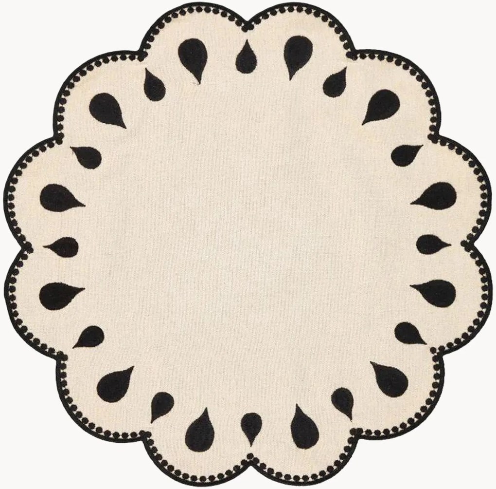 Tovaglietta rotonda con bordo ricamato Gotas