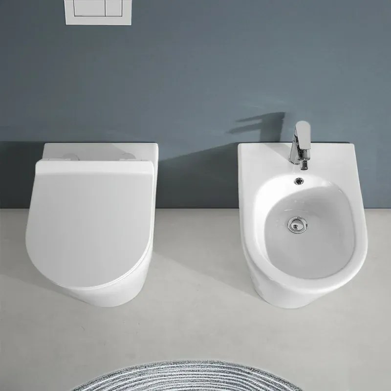 Wc filomuro bianco design tondo in ceramica con scarico Rimless Ukra