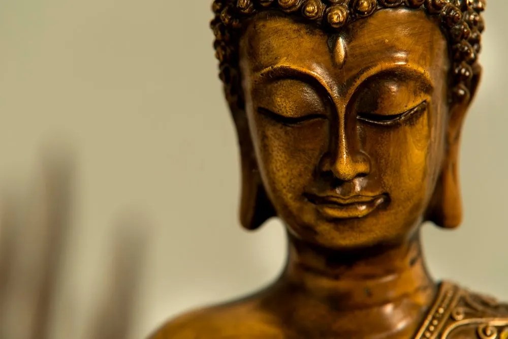 Quadro su tela – Testa di Buddha in bronzo