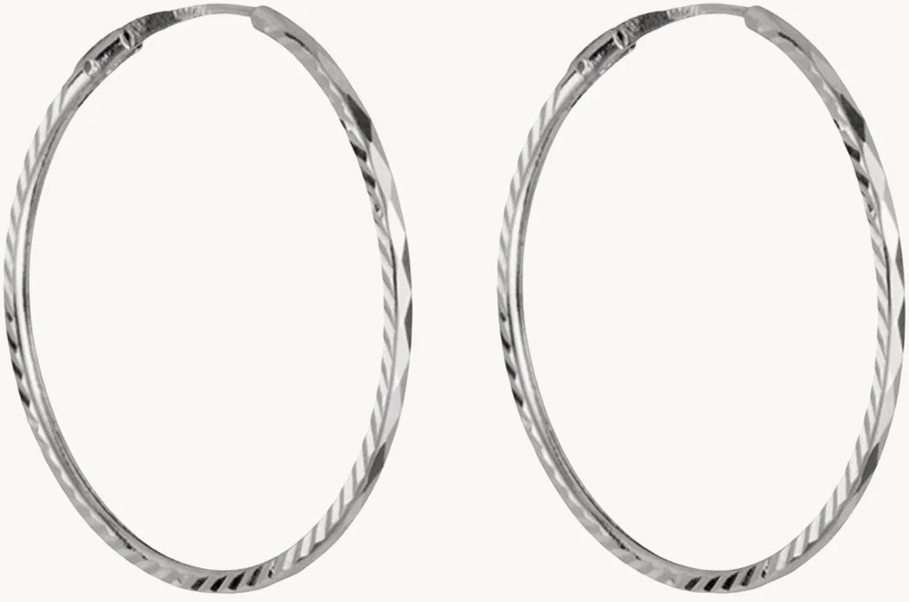Orecchini a cerchio in oro bianco Twist