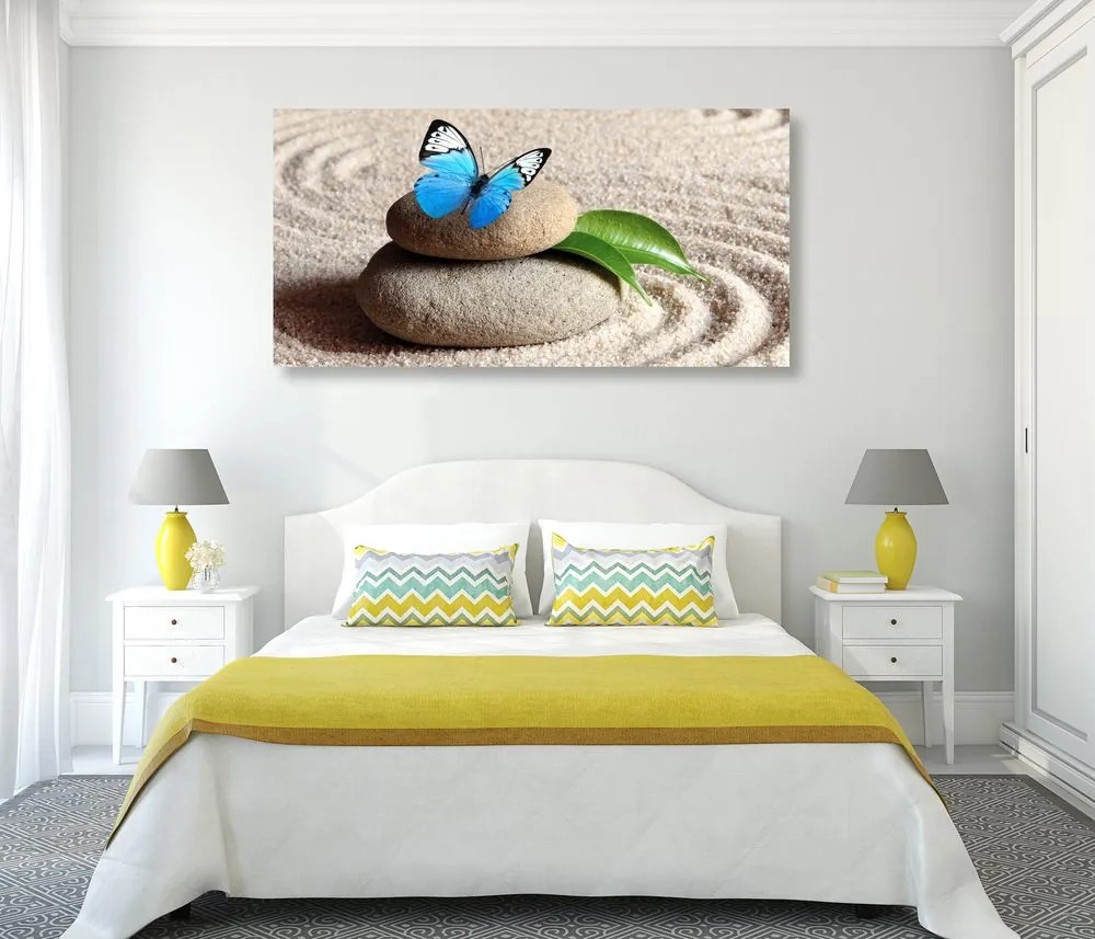 Quadro su tela – Farfalla blu su pietra Zen