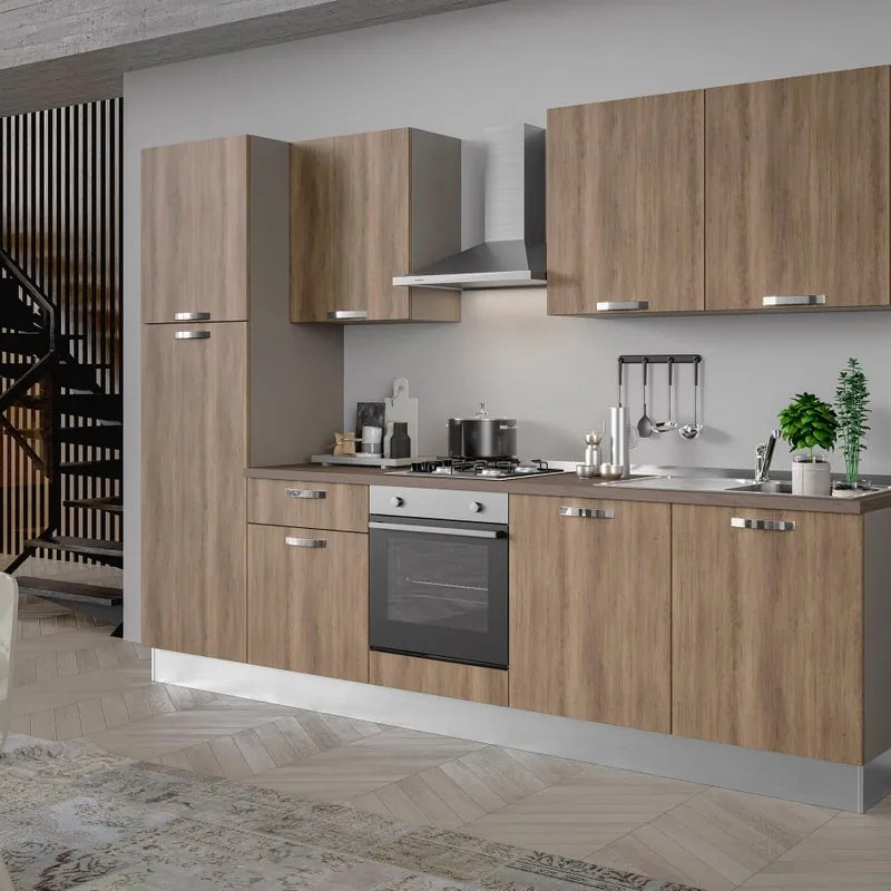 Cucina montata Dora rovere chiaro, lavello a destra, L 300 cm, completa di: cappa a camino, piano cottura a gas, forno, frigorifero