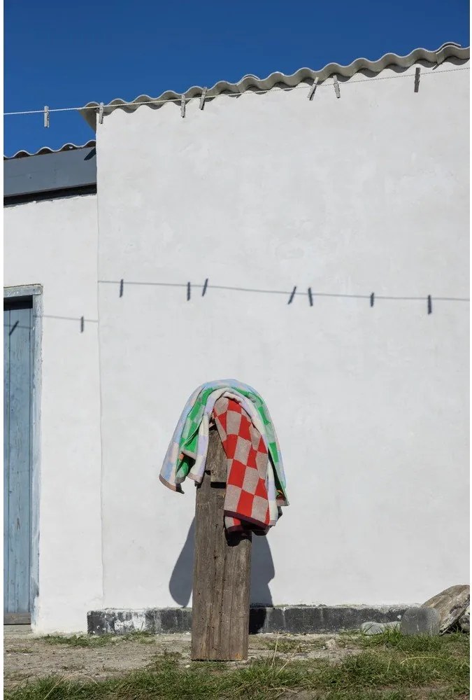 Asciugamano tipo terry arancione/beige in cotone organico 50x90 cm Retro – Mette Ditmer Denmark