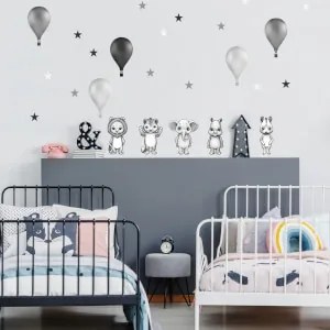 Adesivi in bianco e nero di animaletti con palloncini nello stile nordico | Inspio