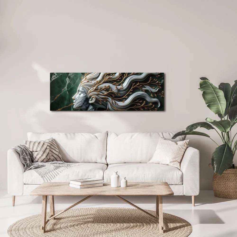 Quadro su tela – Donna unita alla natura con foglie dorate
