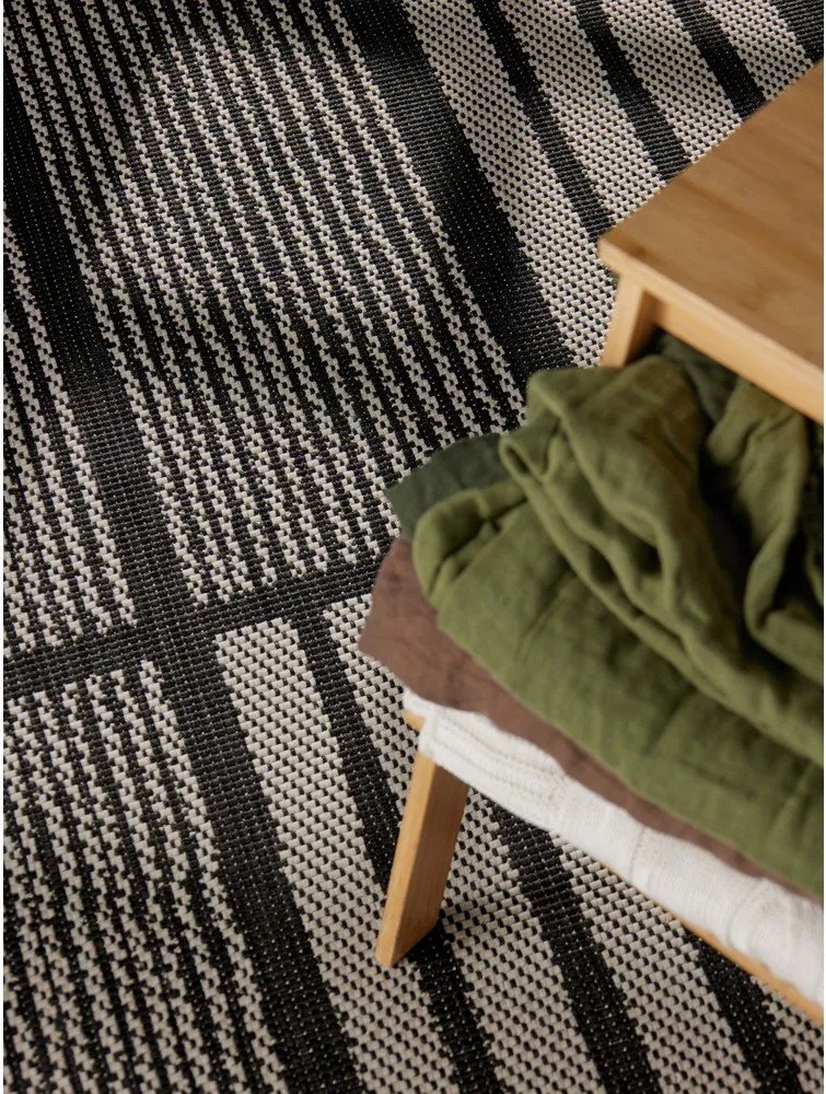 Tappeto da interno/esterno nero/color crema 120x170 cm Haringey Allington – Ted Baker