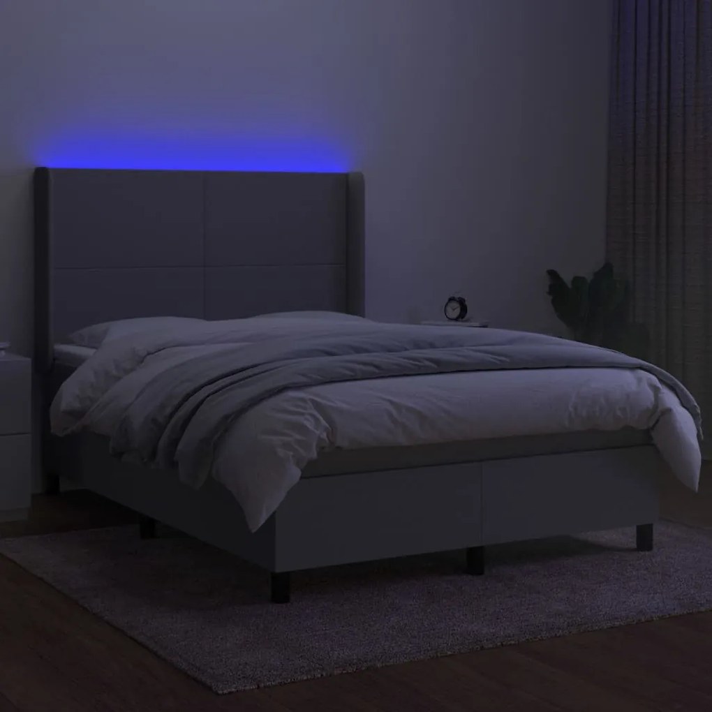 Letto a molle materasso e led grigio chiaro 140x190 cm tessuto