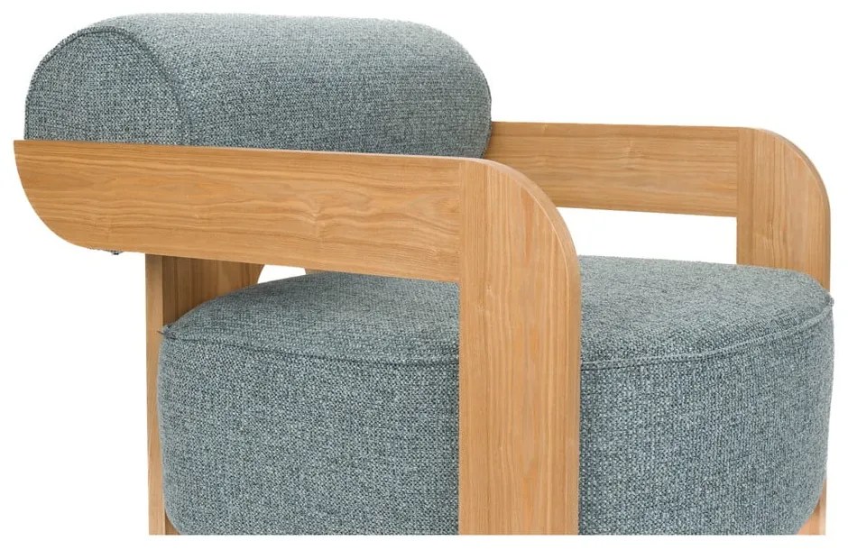 Poltrona blu polveroso con rivestimento in bouclé Oolong – Zuiver