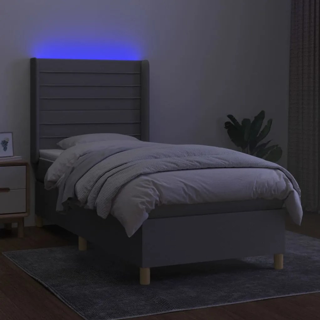 Letto a molle materasso e led grigio chiaro 90x200 cm tessuto