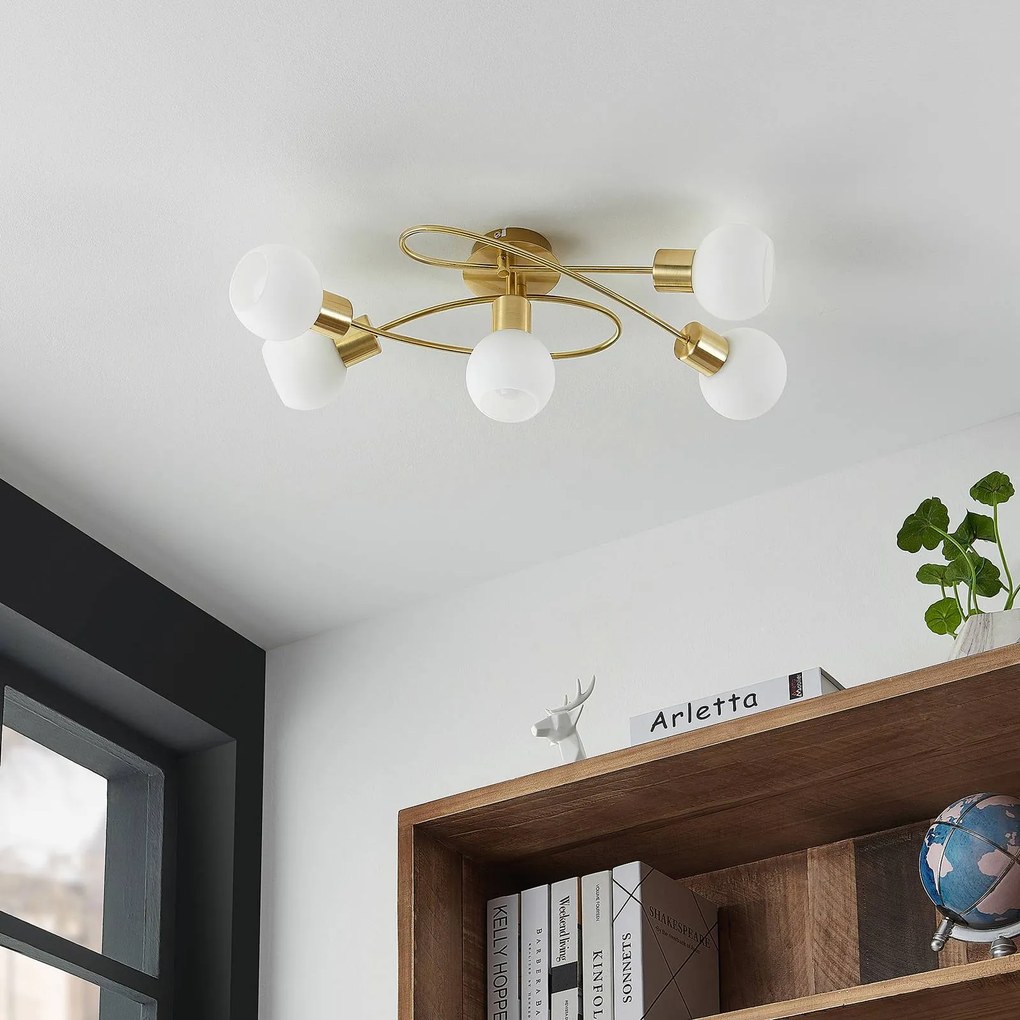 Lindby plafoniera Elaina, 66 cm, a 5 luci, color ottone, vetro
