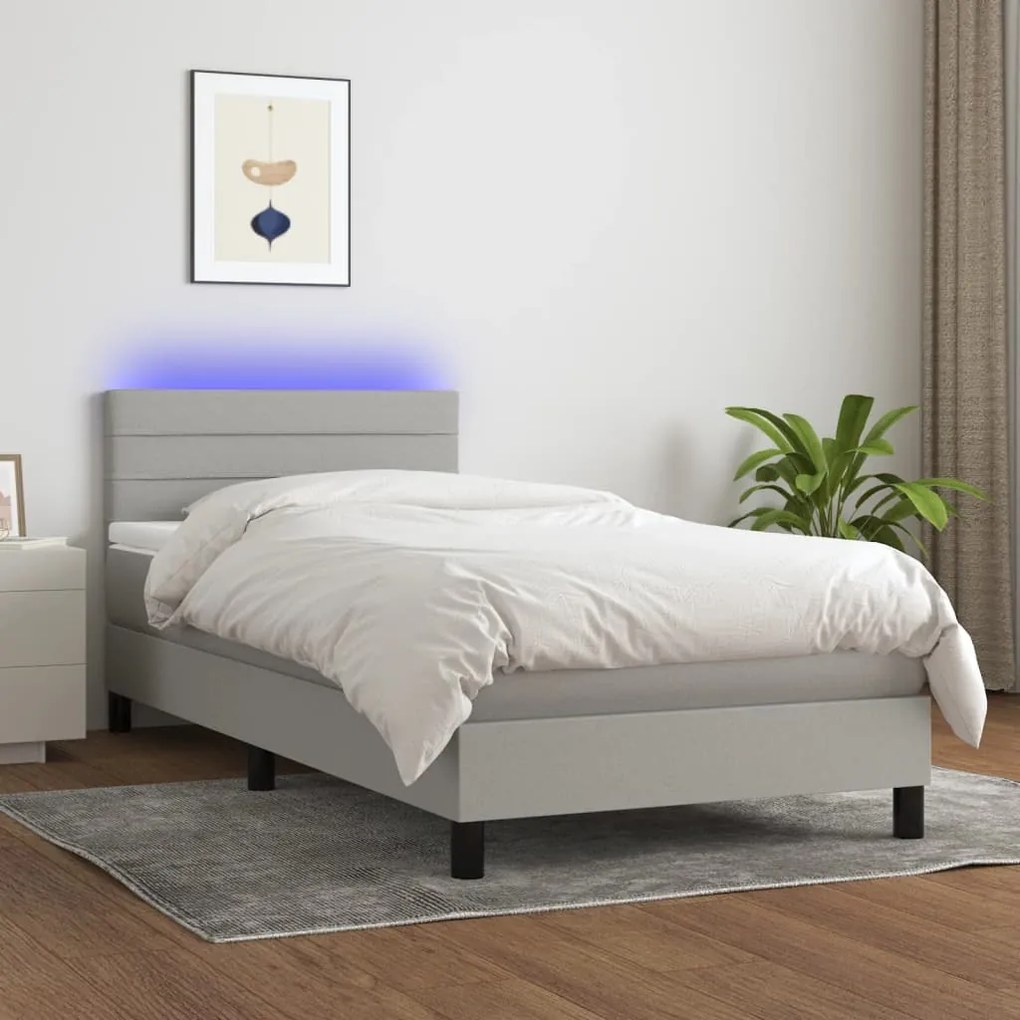 Letto a molle materasso e led grigio chiaro 90x190 cm tessuto