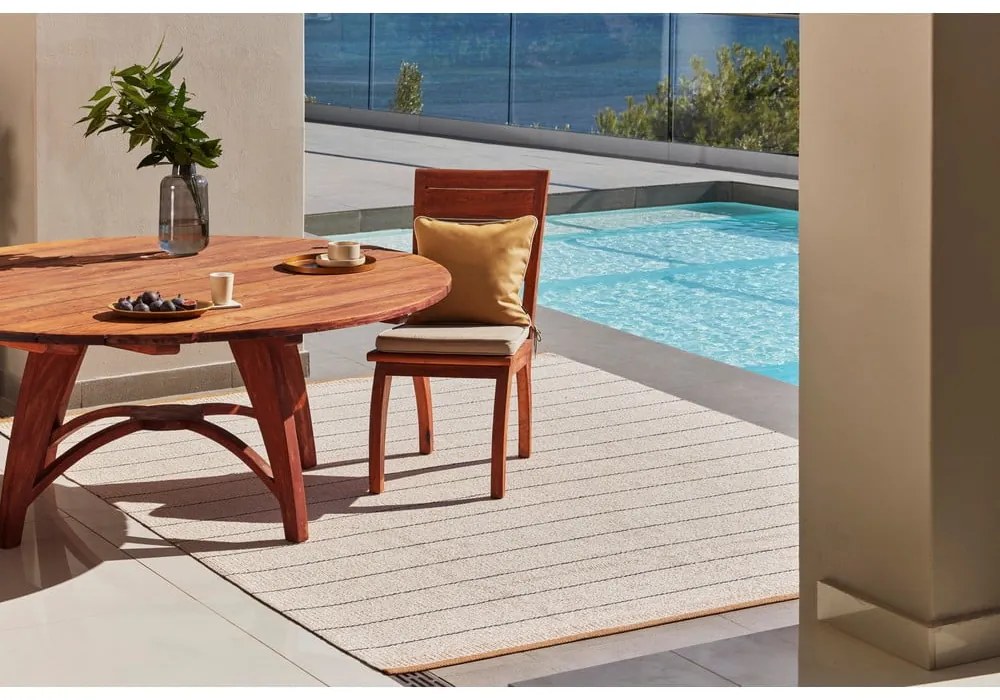 Tappeto da interno/esterno giallo ocra/color crema 140x200 cm Belle Ochre – Pappelina