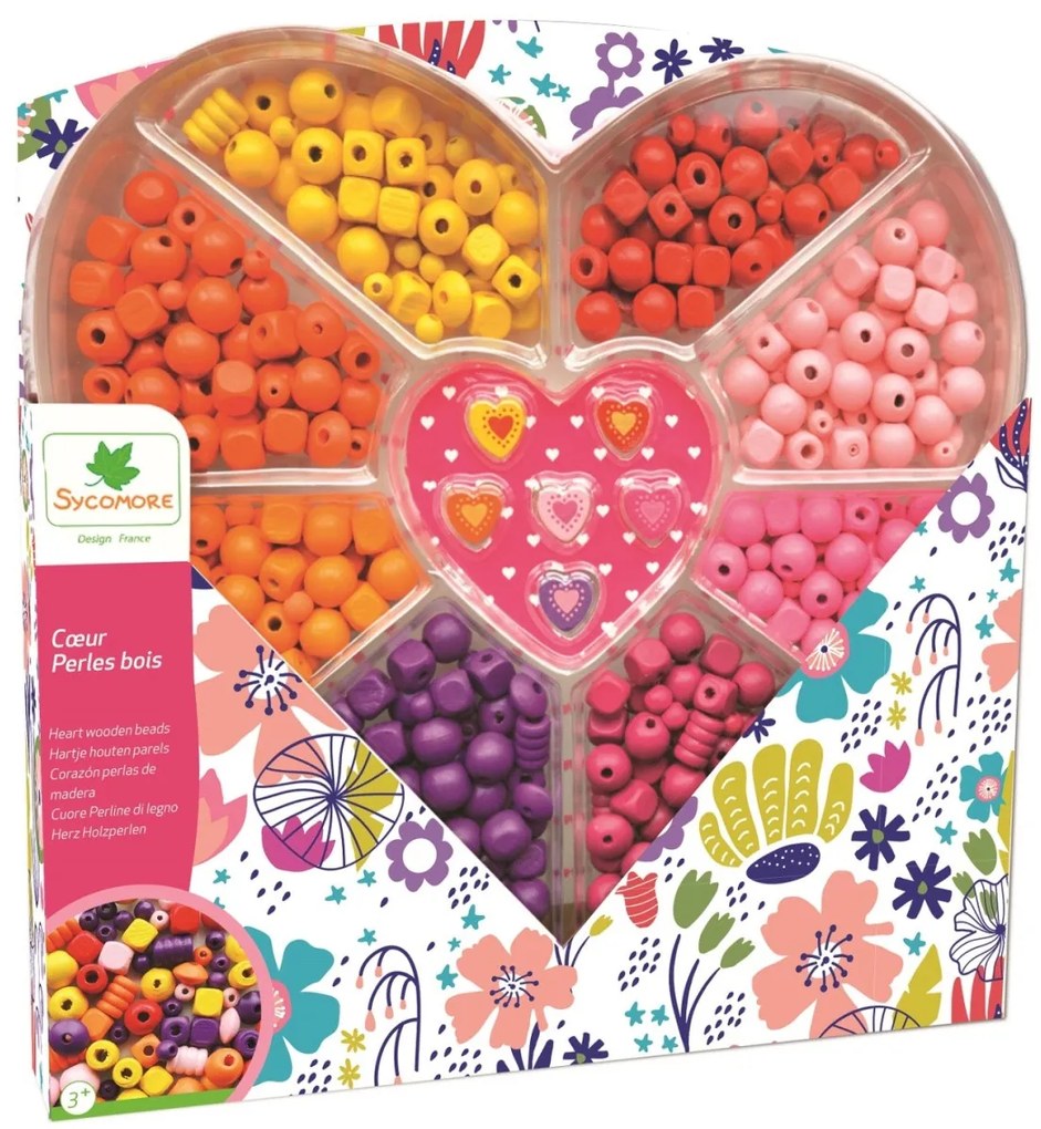 Perline di legno in una scatola a forma di cuore con scomparti