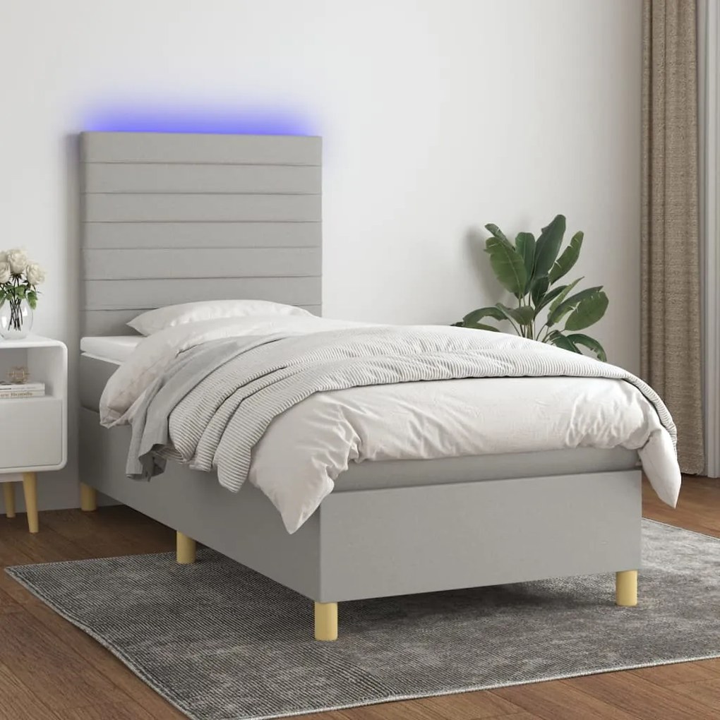 Letto a molle materasso e led grigio chiaro 90x200 cm tessuto