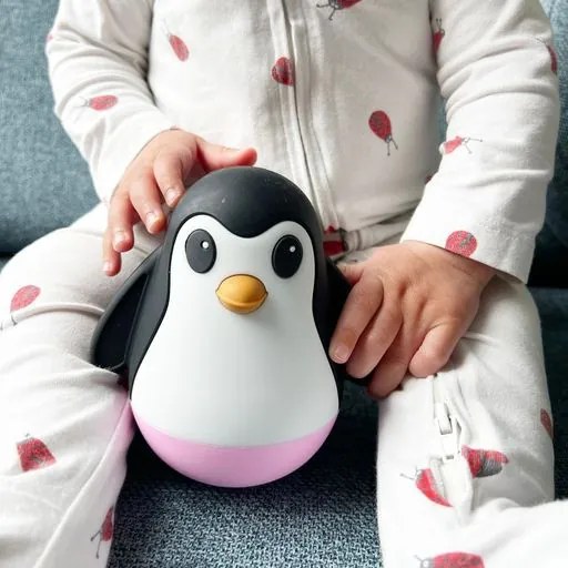 Pinguino oscillante, rosa