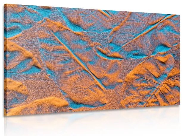 Quadro su tela – Texture di foglie sulla spiaggia di sabbia