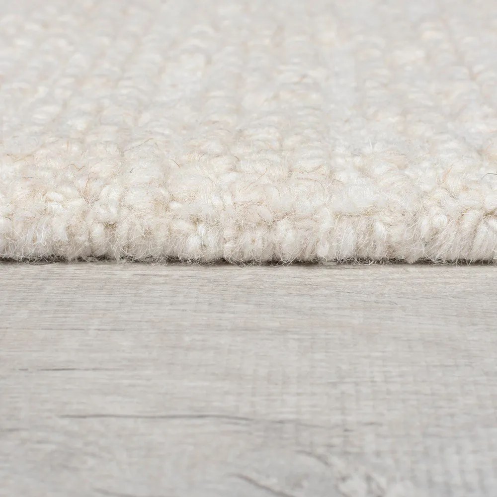 Tappeto avorio in lana tessuto a mano 120x170 cm Harris Boucle – Flair Rugs