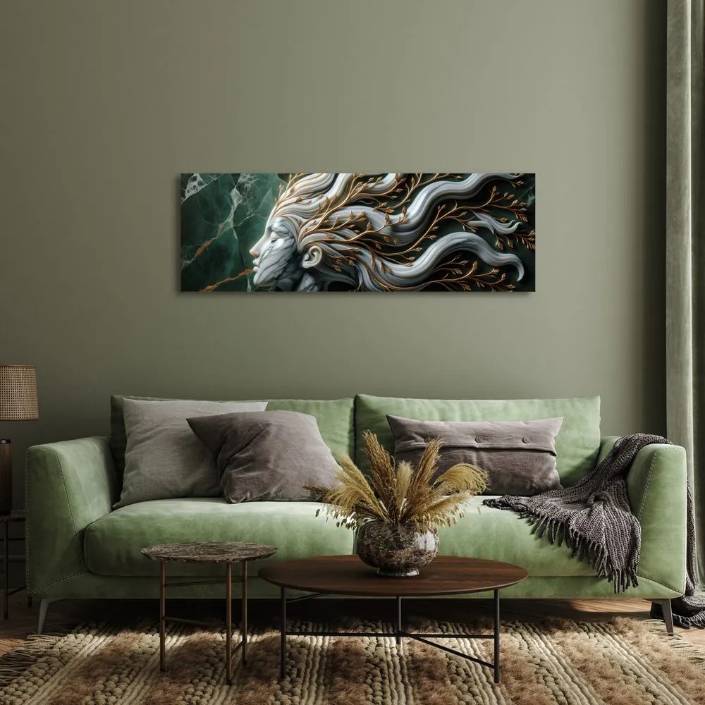 Quadro su tela – Donna unita alla natura con foglie dorate