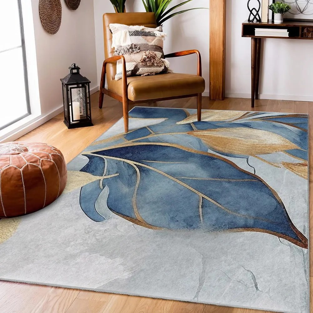 Tappeto blu/dorato lavabile 120x180 cm Golden Leaves – Mila Home