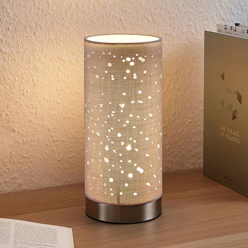 Lindby Lampada da tavolo Umma con aperture, grigia