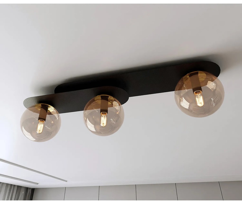 Plafoniera Minimal 3 Luci Teia In Acciaio Nero E Sfere Vetro Ambra