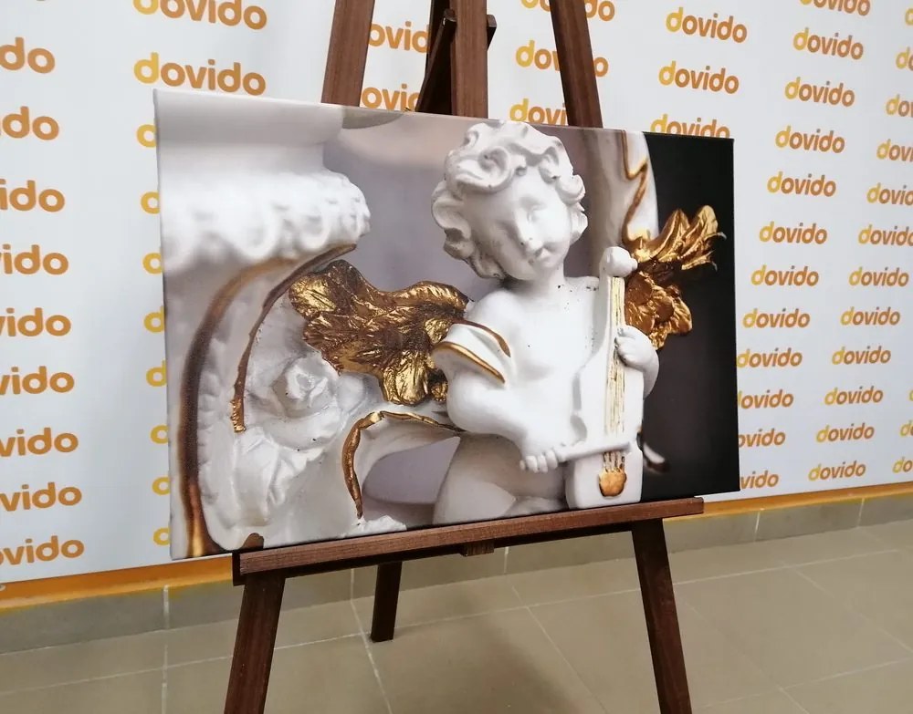 Quadro su tela – Statua di angelo che suona