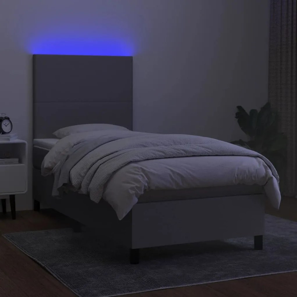 Letto a molle materasso e led grigio chiaro 90x200 cm tessuto