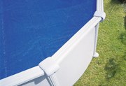 Copertura termica per piscina ovale GRE CPROV500 in polietilene blu 500 x 340 cm