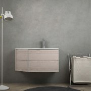 Mobile per bagno sospeso 60 cm Rovere sbiancato design curvo asimmetrico modello Rio con lavabo a destra