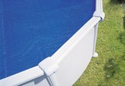 Copertura termica per piscina ovale GRE CPROV500 in polietilene blu 500 x 340 cm