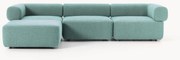 Divano componibile 4 posti in bouclé con poggiapiedi Anton (sinistra/destra)