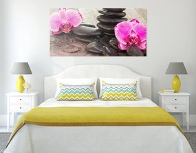 Quadro su tela – Orchidea e pietre Zen su sfondo in legno