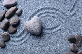 Carta da parati – Cuore di pietra sulla sabbia