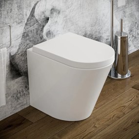 Vaso WC Arco filo muro in ceramica completo di sedile softclose