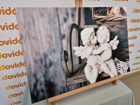Stampa su tela – Statuette di angioletti sulla panchina