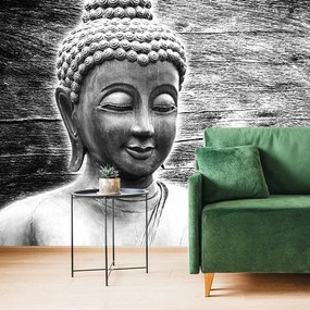 Carta da parati autoadesiva – Statua di Buddha in bianco e nero su sfondo di legno