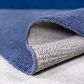 Tappeto rotondo blu in lana tessuto a mano ø 150 cm Mia Segment – Flair Rugs