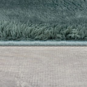 Tappeto in pelliccia sintetica color petrolio 80x150 cm Faroe Wool Look Fur - Flair Rugs