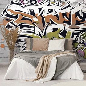 Carta da parati autoadesiva – Scritta Street Art arancione con spray
