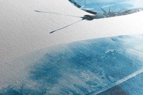 Stampa su tela – Piuma con farfalla in blu