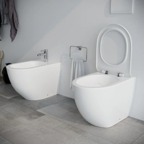 Bidet e Vaso WC Fast filo muro in ceramica completo di sedile softclose