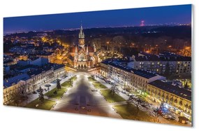 Quadro in vetro Panorama della chiesa notturna di cracovia 100x50 cm