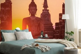 Carta da parati autoadesiva – Statua di Buddha tra le pietre