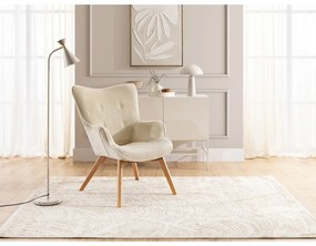 Poltrona con poggiapiedi beige con rivestimento in velluto a coste Niko – Ropez