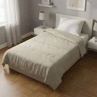 Trapunta singola beige a quadretti