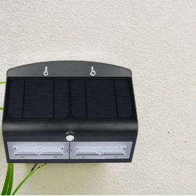 Lampada da parete solare a LED con sensore LED/7W/3,7V 4000K IP65 nero
